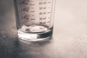 A measuring glass on a table