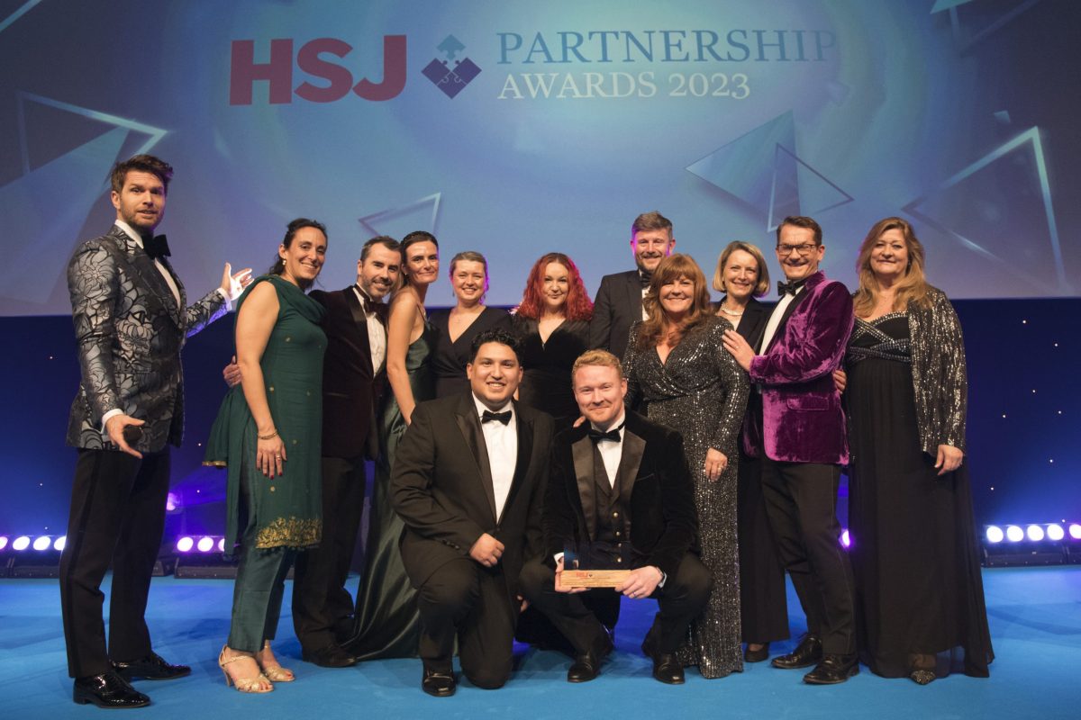 The team of national hep C coordinators from the hep C drug treatment providers forum celebrate winning an award for Best Healthcare Analytics Project for the NHS